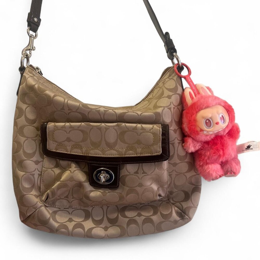 Vintage Coach Penelope Rare Find with Turn Locks.